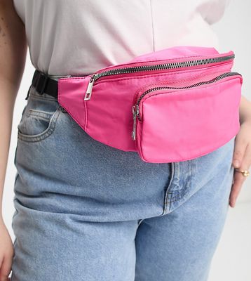 ASOS DESIGN Curve fanny pack with front pocket in pink
