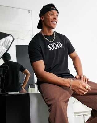 ASOS DESIGN t-shirt in black with city chest print