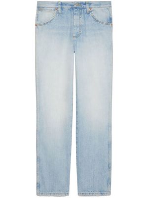Gucci logo-embroidered washed-denim jeans - Blue