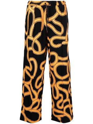 Marcelo Burlon County of Milan Snake-print track pants - Black