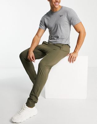 Reebok Training Techstyle sweatpants in khaki-Green