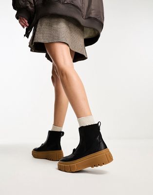 Sorel Caribou x chelsea boots in black