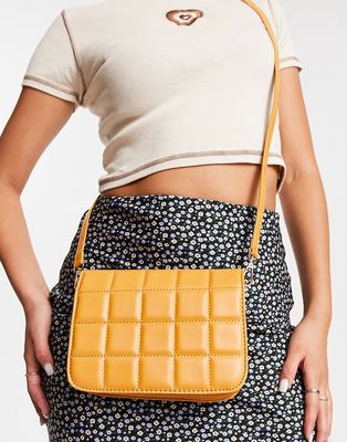SVNX quilted padded crossbody bag in tan-White