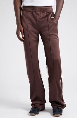 Wales Bonner Kola Embroidered Logo Track Pants in Brown And Ivory
